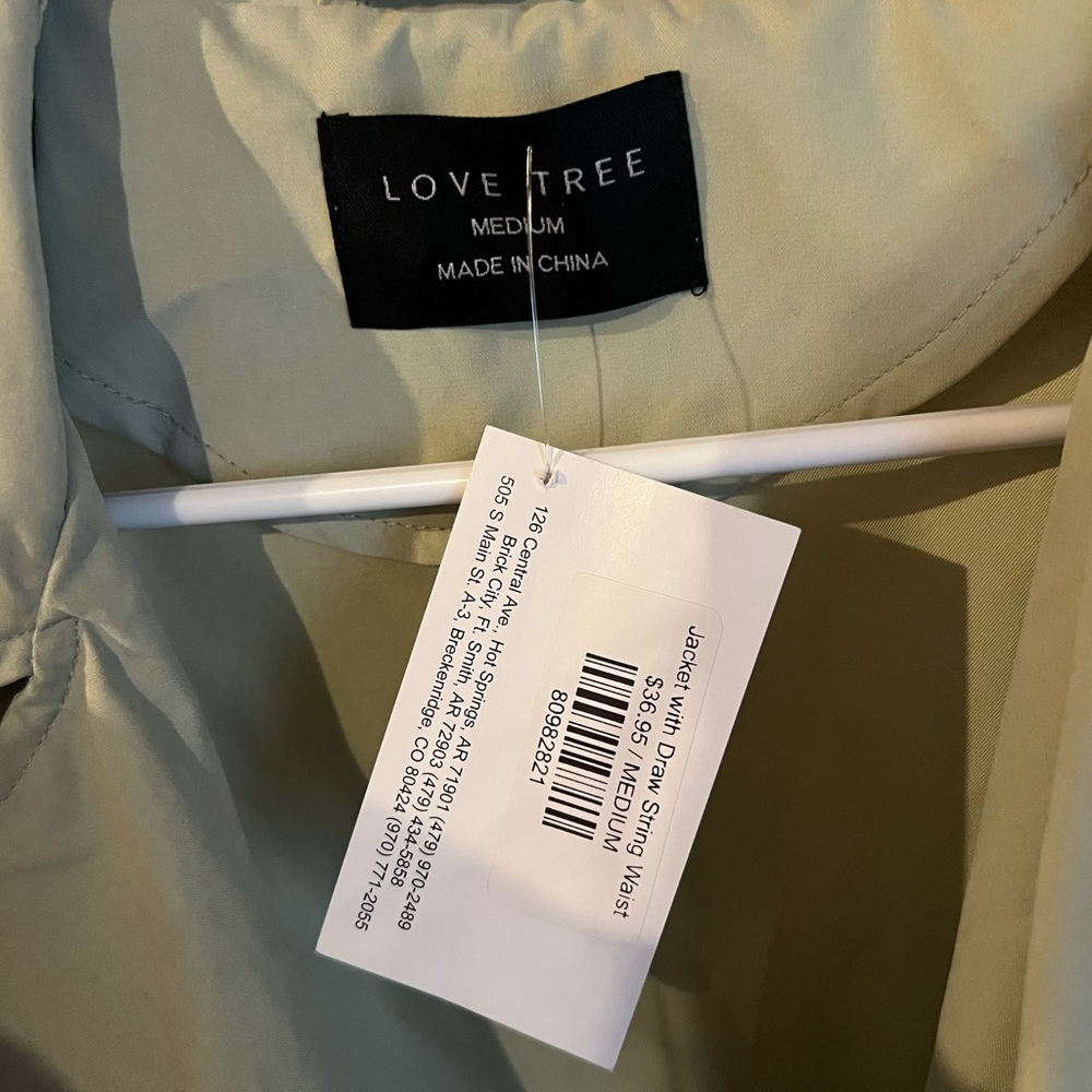 Light green light weight jacket with draw string waist😊 size M